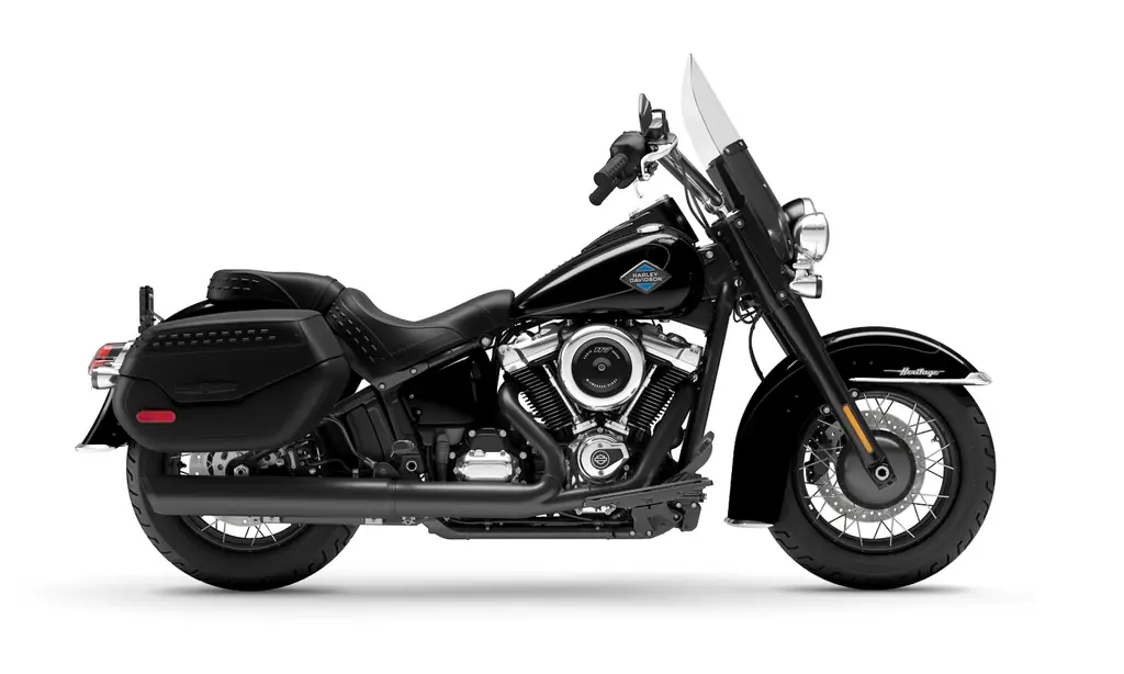 Side view of a black 2026 Harley-Davidson Heritage Classic with its screen and lockable saddlebags fitted