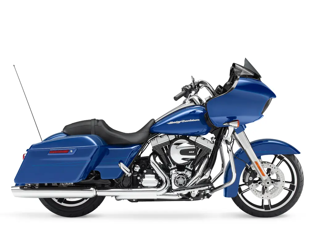 Right-side studio view of a blue 2015 Harley-Davidson Road Glide Special with a low windscreen, chrome exhaust and hard saddlebags.