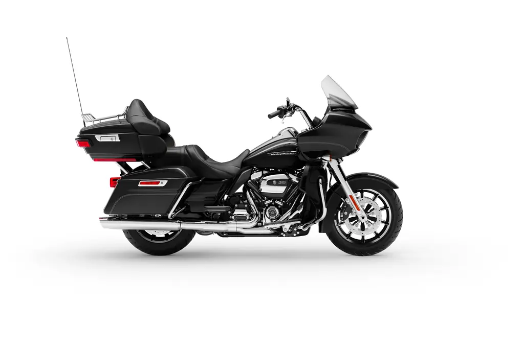 Right-side studio view of a black 2019 Harley-Davidson Road Glide Ultra with a tall windscreen, Tour-Pak and hard saddlebags.