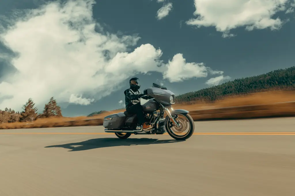 2025 Harley-Davidson Street Glide, grey, ridden on an open road