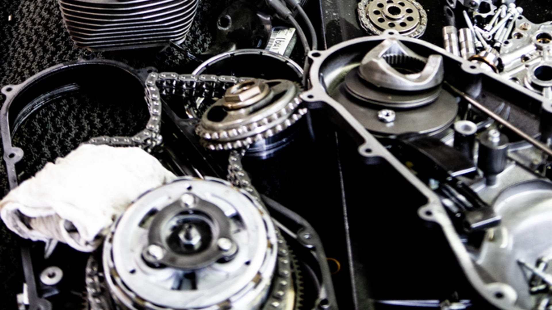 A Harley-Davidson engine torn down on a workbench during a major service
